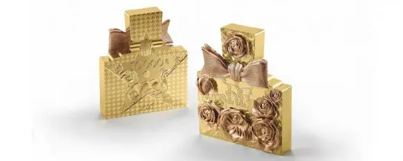 Sticla parfumului Miss Dior a fost transformată într-o monedă de aur de 2 kg