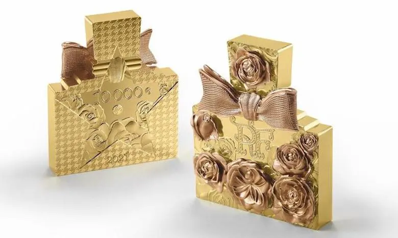 Sticla parfumului Miss Dior a fost transformată într-o monedă de aur de 2 kg