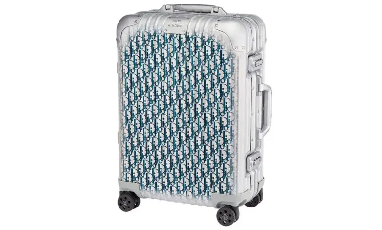 Dior și RIMOWA relansează valiza lor emblematică din aluminiu